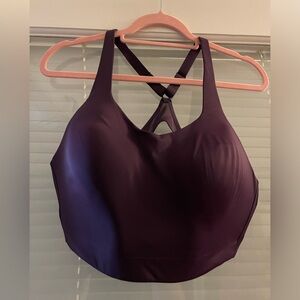 Athleta sports bra. Purple. Elastic back strap. Size 40c  adjustable straps.